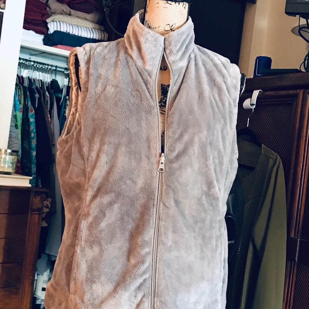 Reversible fur lined winter vest.  Size Large.